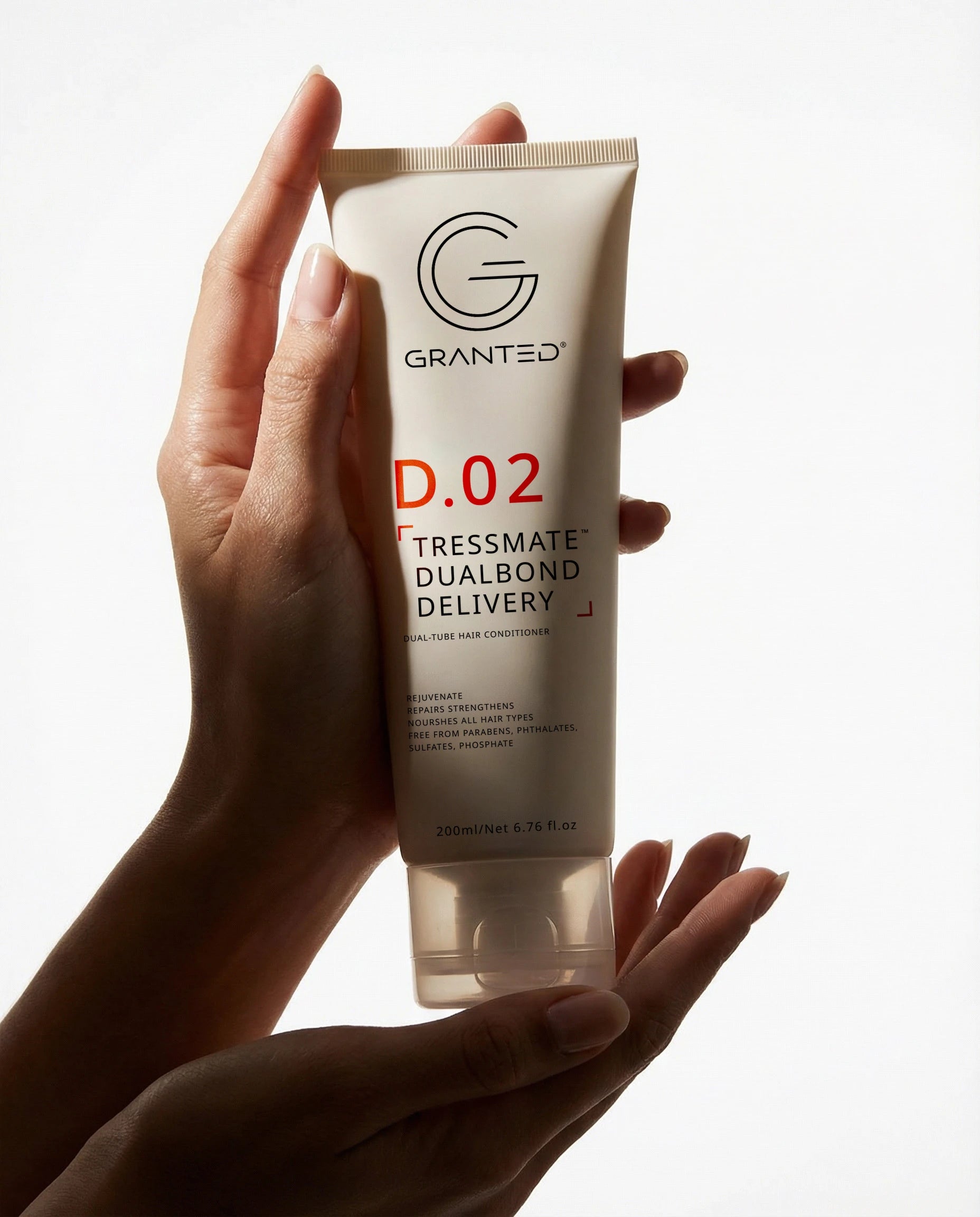 Packshot of Granted D.02 Tressmate DualBond Conditioner, front label, bond repair formula.