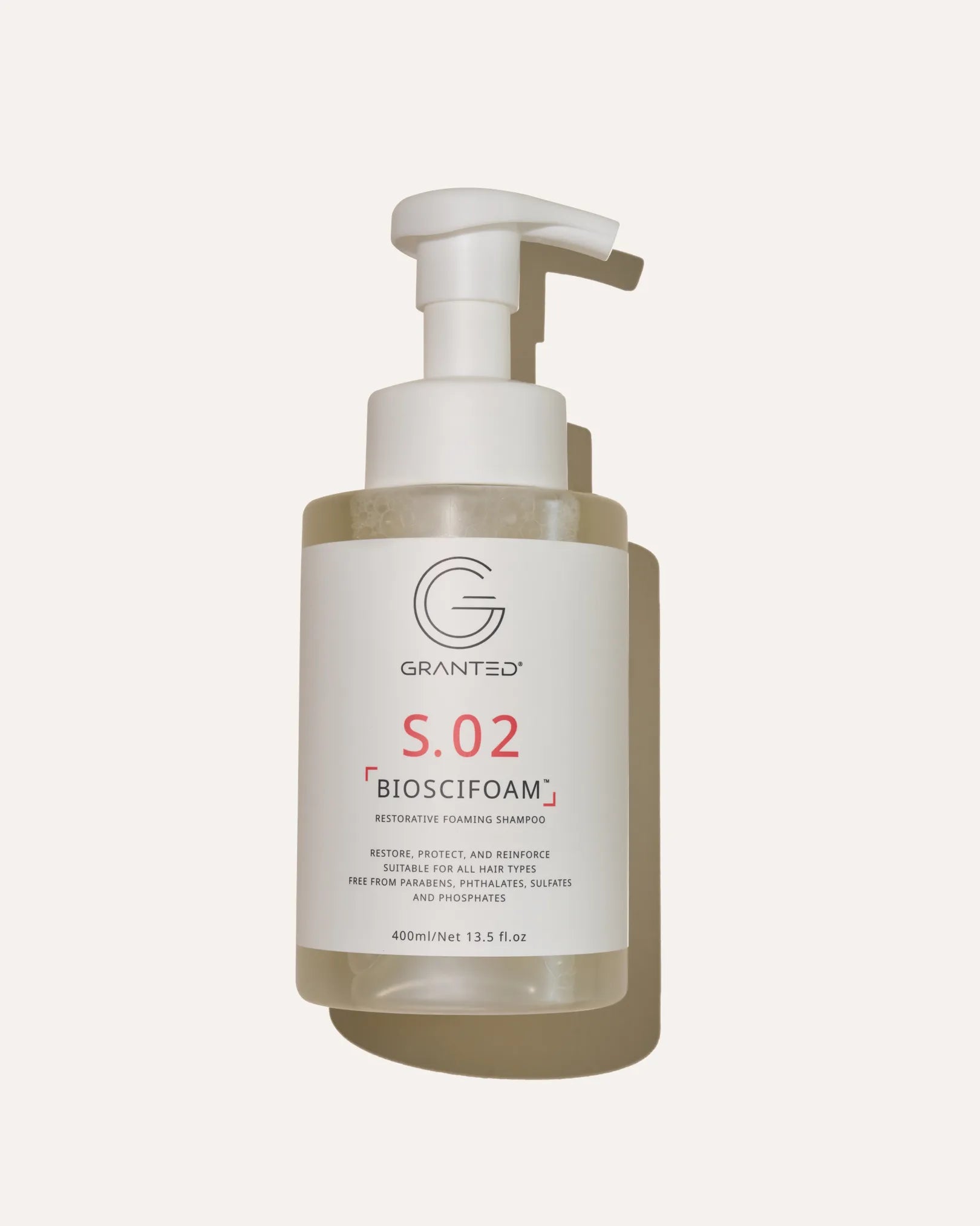 Single Granted S.02 BIOSCIFOAM bottle product shot; repair shampoo for damaged hair.
