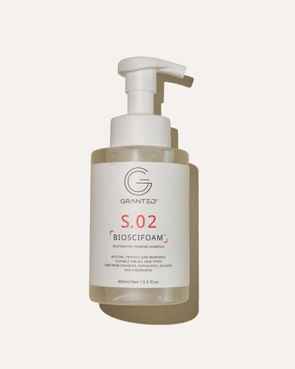 Single Granted S.02 BIOSCIFOAM bottle product shot; repair shampoo for damaged hair.
