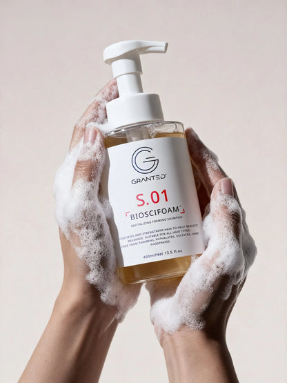 Single Granted S.02 BIOSCIFOAM bottle product shot; repair shampoo for damaged hair.