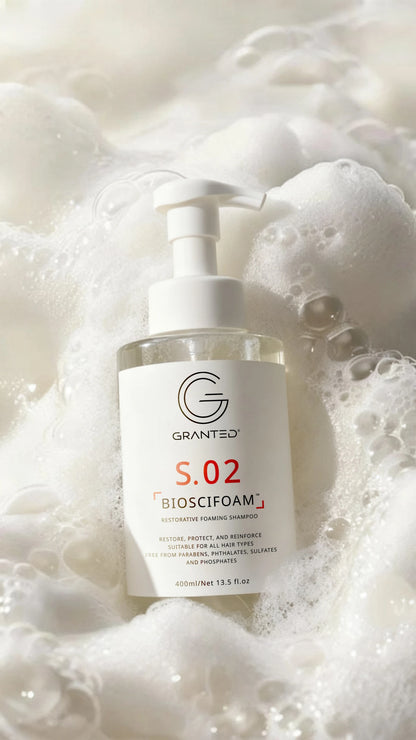 Single Granted S.02 BIOSCIFOAM bottle product shot; repair shampoo for damaged hair.