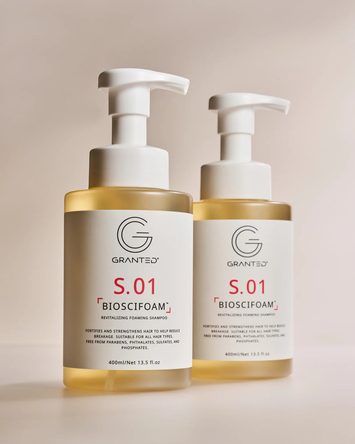 Granted bond-repair trio: S.01 clarifying shampoo + D.02 DualBond conditioner + T.01 leave-in serum for dry, damaged, frizzy hair